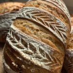 Close up decorative wholewheat sourdough loaf