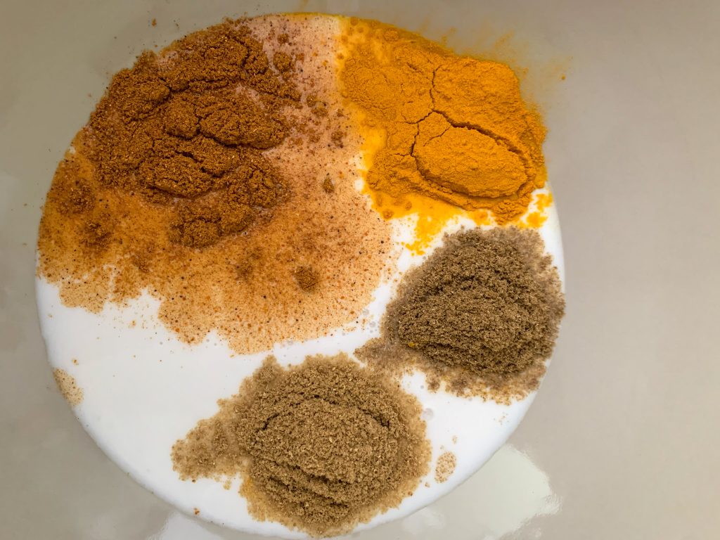 spices in coconut milk to make easy dairy free curry marinade
