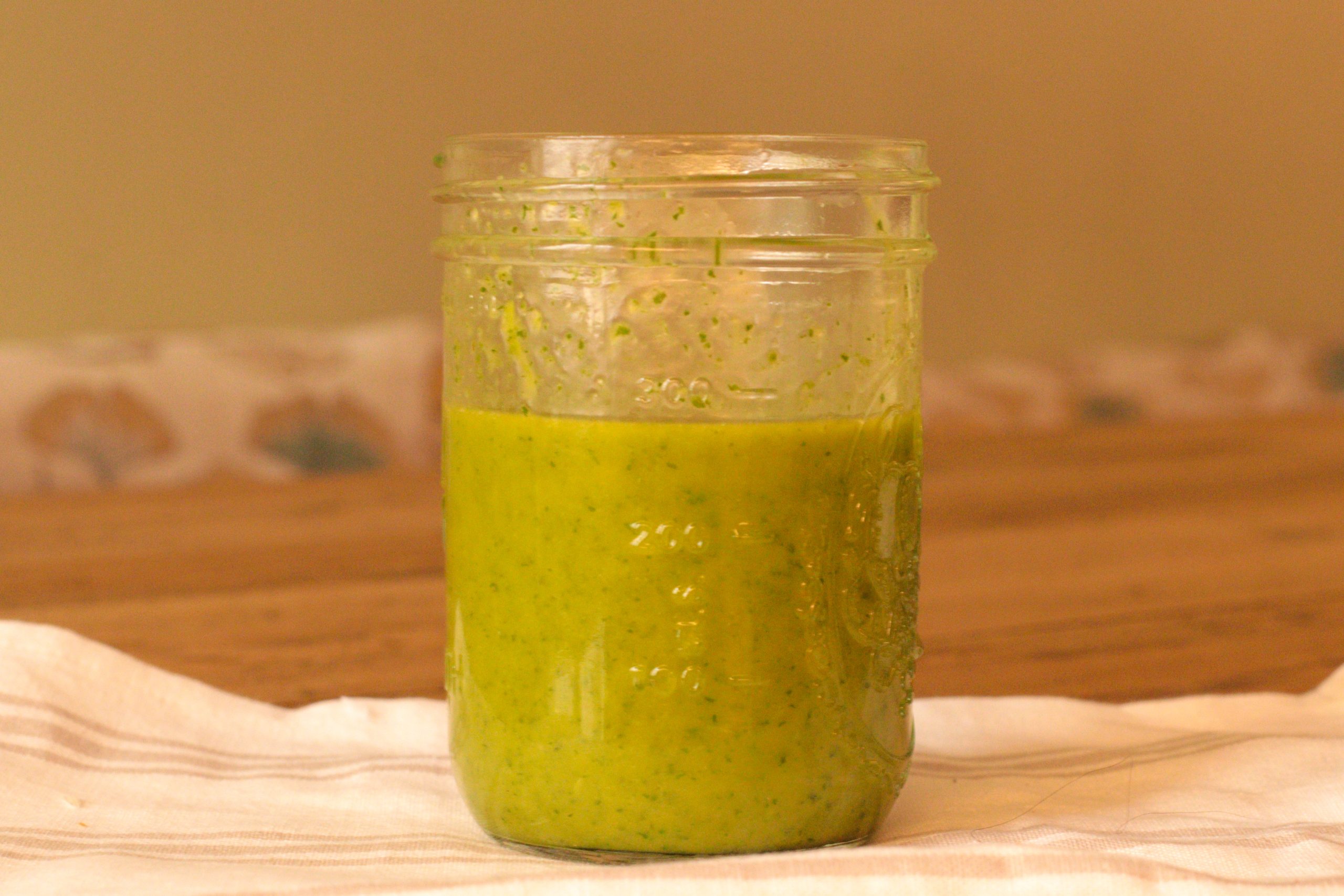 finished sweet basil dressing in a mason jar