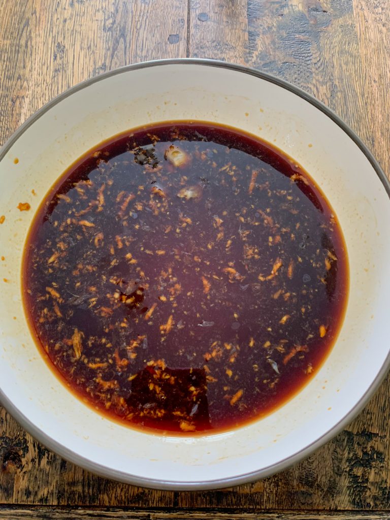 easy soy sauce marinade with honey and garlic in a bowl