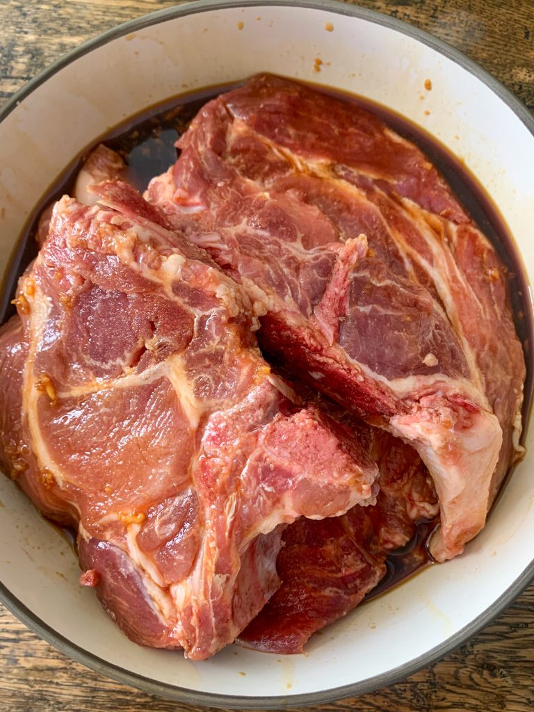 pork chops marinating in soy sauce marinade