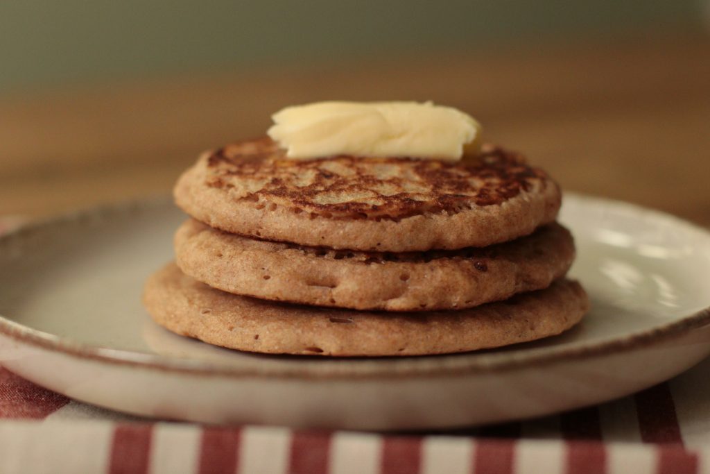 stack of sourdough pancakes with butter